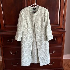 Two piece dress suit worn to wedding. Light mint green.